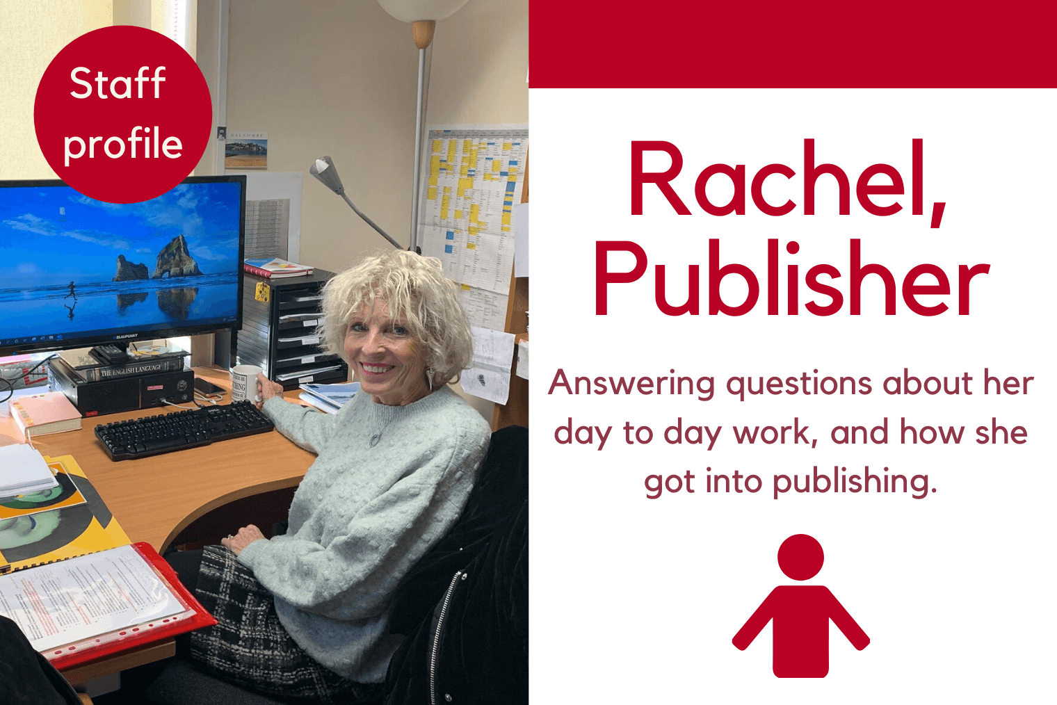image of Rachel sitting at her desk and smiling. You can see a computer screen