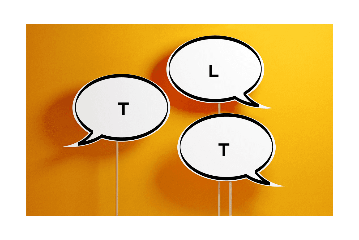 Three speech bubbles on a yellow background spelling TLT.