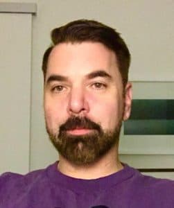 Selfie of Tyson, a middle aged white man with a beard and moustache.